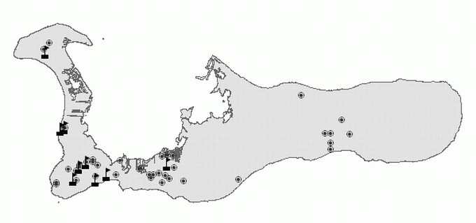 Fig. 2. The distribution of hickatees and red-eared slider turtles on Grand Cayman. Ponds with hickatees are marked with a circle and ponds with both hickatees and red-eared sliders marked with a flag.