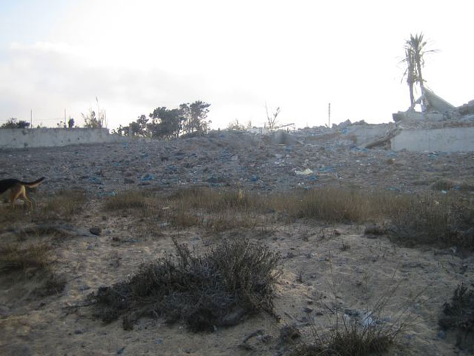 Fig. 1. Bomb devastation and shredded plastic on the beach.